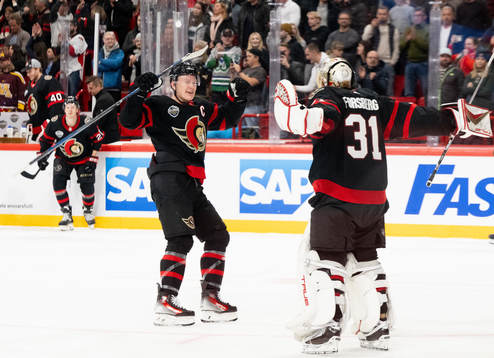 Brady Tkachuk and goaltender Anton Forsberg of Ottawa