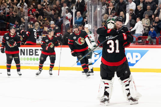 Brady Tkachuk and goaltender Anton Forsberg of Ottawa