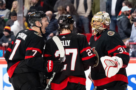 Brady Tkachuk and goaltender Anton Forsberg of Ottawa
