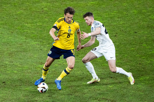 Albin Ekdal of Sweden and Markus Poom of Estonia