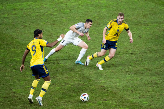 Jens Cajuste and Dejan Kulusevski of Sweden against Artur