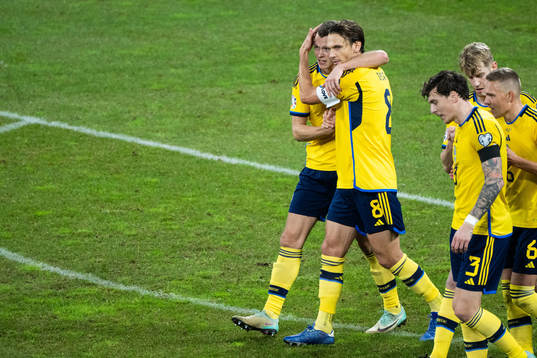 Viktor Claesson of Sweden celebrates with Albin Ekdal
