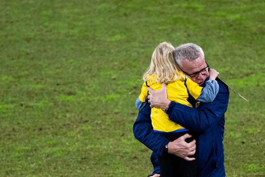 Head coach Janne Andersson of Sweden with his grandchild