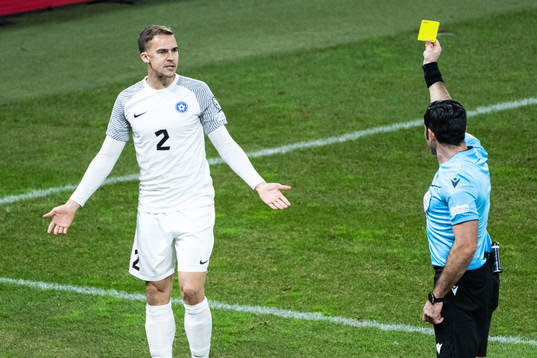 Märten Kuusk of Estonia reacts to Referee Fabio Maresca