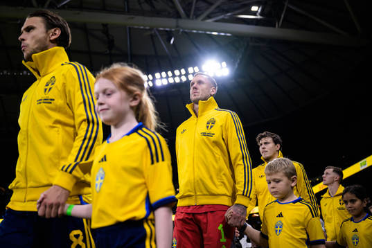 Albin Ekdal and goalkeeper Robin Olsen  of Sweden with