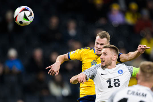 Viktor Claesson of Sweden scores the 1-0 goal behind Karol