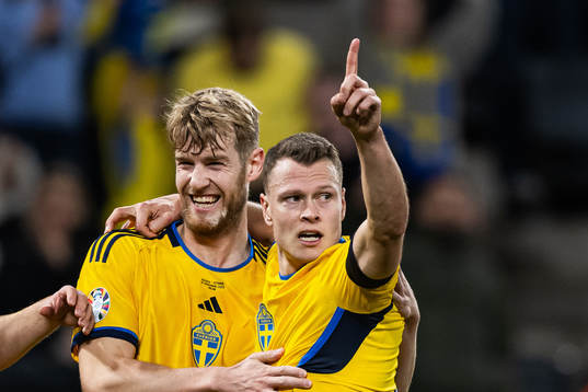 Filip Helander and Viktor Claesson of Sweden celebrate the