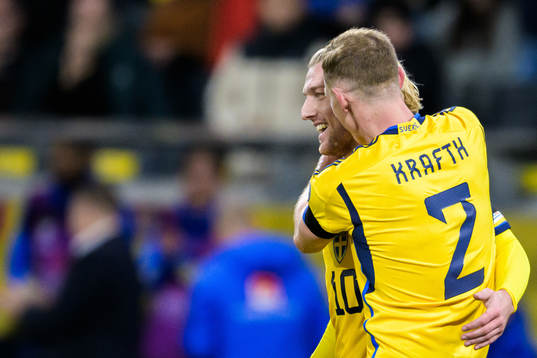 Emil Forsberg and Emil Krafth of Sweden celebrate the 2-0