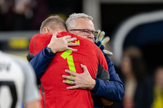 Head coach Janne Andersson  and goalkeeper Robin Olsen of