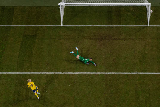 Emil Forsberg of Sweden scores the 2-0 goal behind