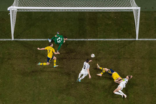Artur Pikk and goalkeeper Karl Jakob Hein of Estonia
