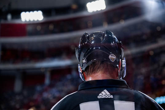 A referee with the Börje Salming ALS Foundation sticker