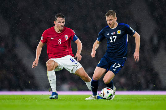 Sander Berge of Norway and Stuart Armstrong of Scotland