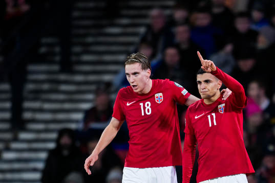 Mohamed Elyounoussi of Norway celebrates with teammate
