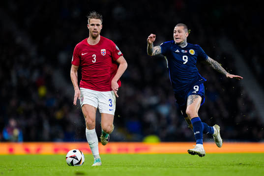 Kristoffer Ajer of Norway and Lyndon Dykes of Scotland