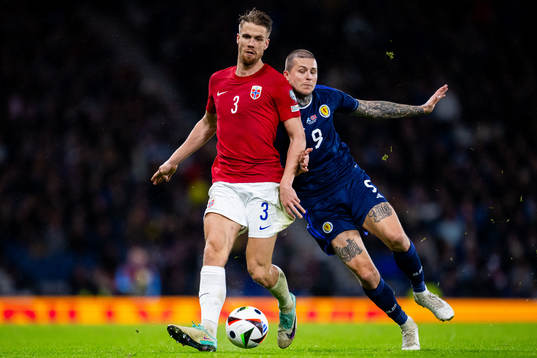 Kristoffer Ajer of Norway and Lyndon Dykes of Scotland