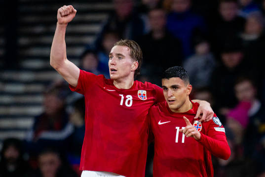 Mohamed Elyounoussi of Norway celebrates with teammate