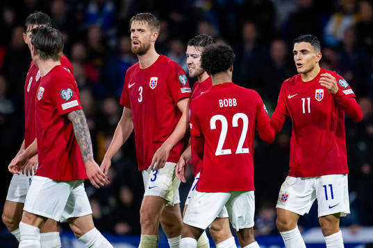 Mohamed Elyounoussi of Norway celebrates with teammate
