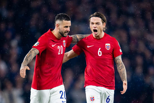 Aron Dønnum of Norway celebrates with teammate Patrick Berg