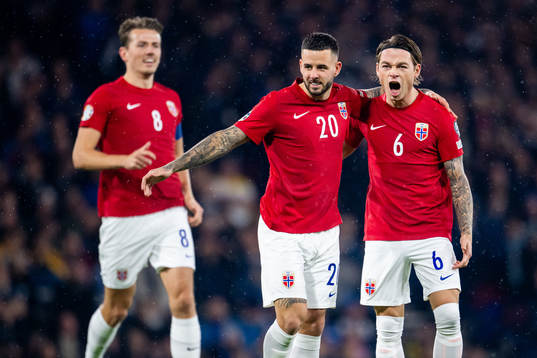 Aron Dønnum of Norway celebrates with teammate Patrick Berg