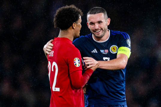 Oscar Bobb of Norway and John McGinn of Scotland