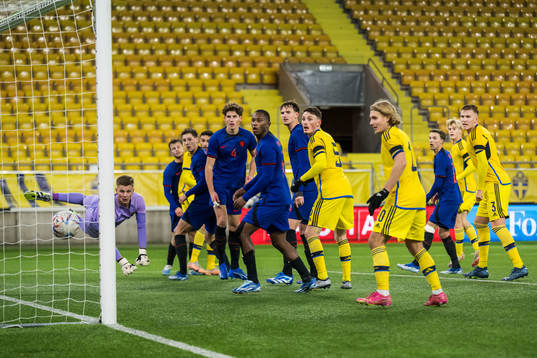 Joakim Persson of Sweden (Not pictured) scores 2-3