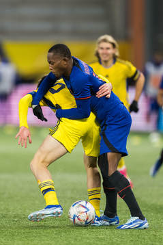 Armin Gigovic of Sweden and Neraysho Kasanwirjo of
