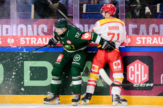 Per Åslund of Färjestad and Yanik Burren of EHC Biel