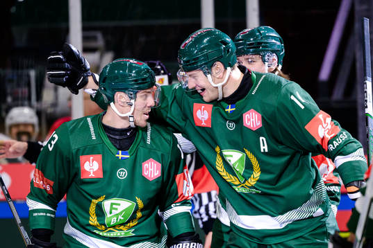Joel Kellman and Victor Ejdsell of Färjestad celebrating