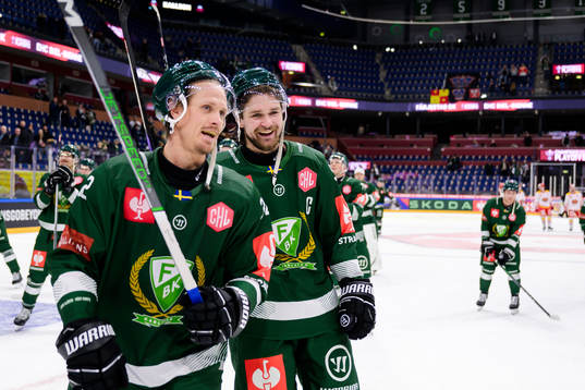 Magnus Nygren and Linus Johansson of Färjestad celebrates