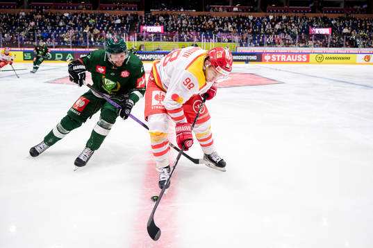 Carl Dahlström of Färjestad and Luca Christen of EHC Biel