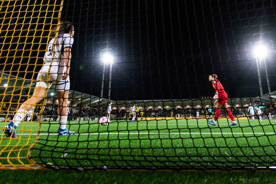 Rocio and goalkeeper Misa of Real Madrid look dejected