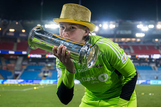 Lene Christensen of Rosenborg celebrates with the trophy