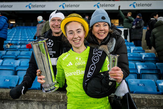 Karen Oline Sneve of Rosenborg celebrates with the trophy