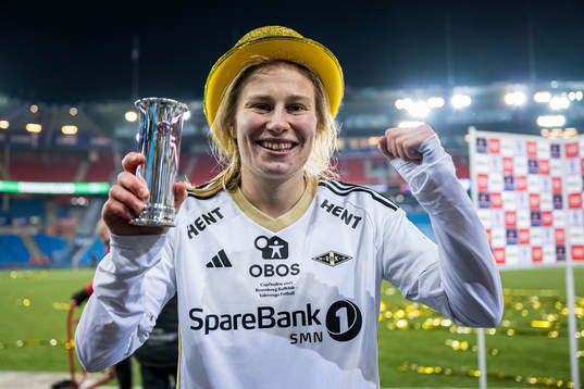 Cesilie Andreassen of Rosenborg celebrates with the trophy