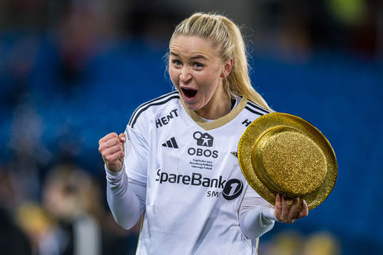Anna Jøsendal of Rosenborg celebrates with the trophy