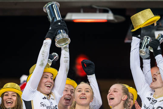 Emilie Nautnes of Rosenborg celebrates with the trophy