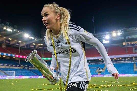 Anna Jøsendal of Rosenborg celebrates with the trophy