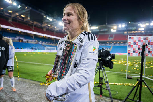 Cesilie Andreassen of Rosenborg celebrates with the trophy