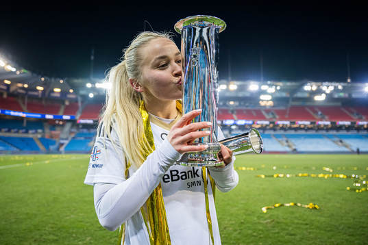 Anna Jøsendal of Rosenborg celebrates with the trophy