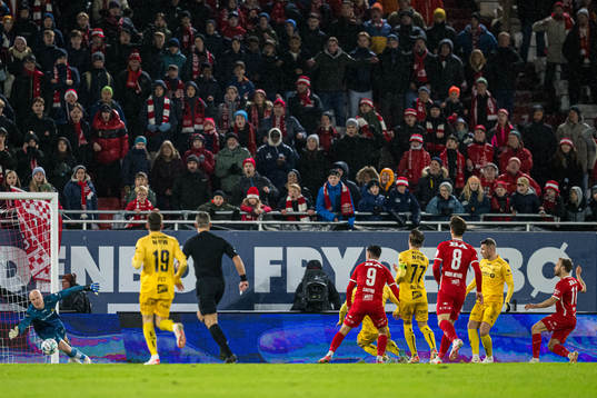 Bård Finne of Brann scores the 1-0 goal