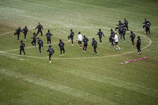Players warm up