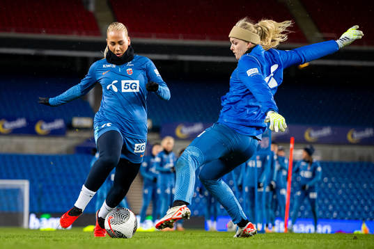 Cathinka Tandberg and goalkeeper Guro Pettersen of the