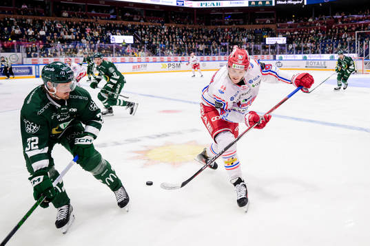 Färjestads Magnus Nygren och Timrås Sebastian Hartmann
