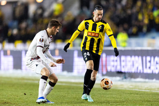 Josip Stanisic of Bayer Leverkusen and Amor Layouni of BK