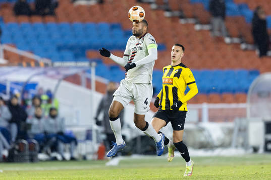 Jonathan Tah of Bayer Leverkusen and Srdjan Hrstic of BK