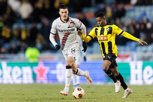 Patrik Schick of Bayer Leverkusen and Abdulrazaq Ishaq of