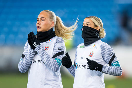 Cathinka Tandberg and Celin Bizet Ildhusøy of Norway warms