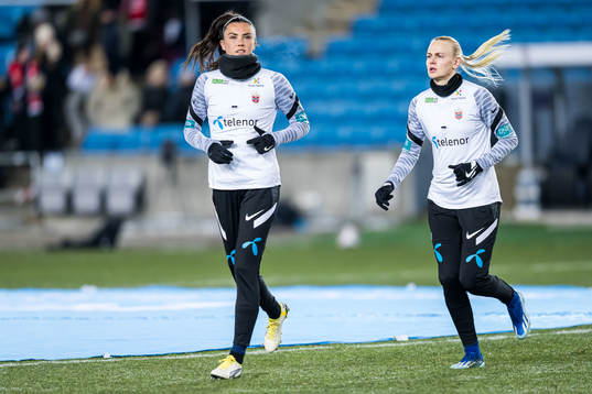 Ingrid Syrstad Engen and Karina Sævik of Norway warms up