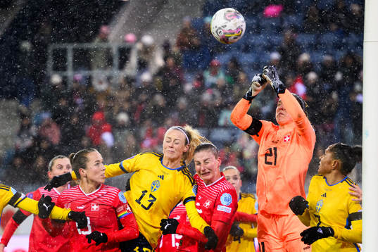 Amanda Ilestedt of Sweden and goalkeeper Elvira Herzog of